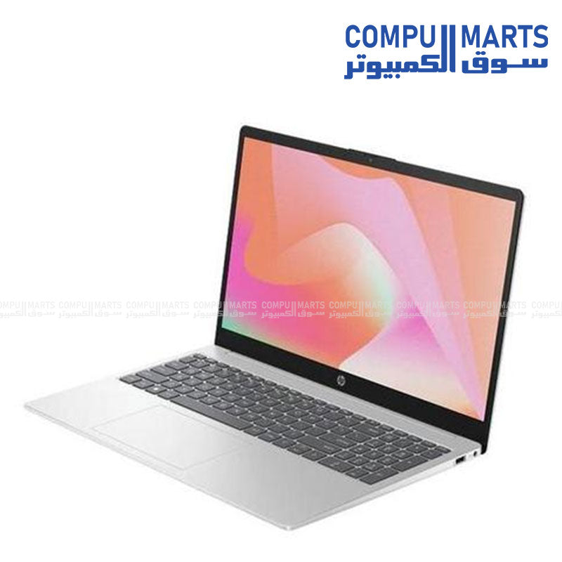 HP 15-fd2023ne laptop, open lid showing keyboard, trackpad, and screen with Windows desktop, Compumarts branding visible on screen